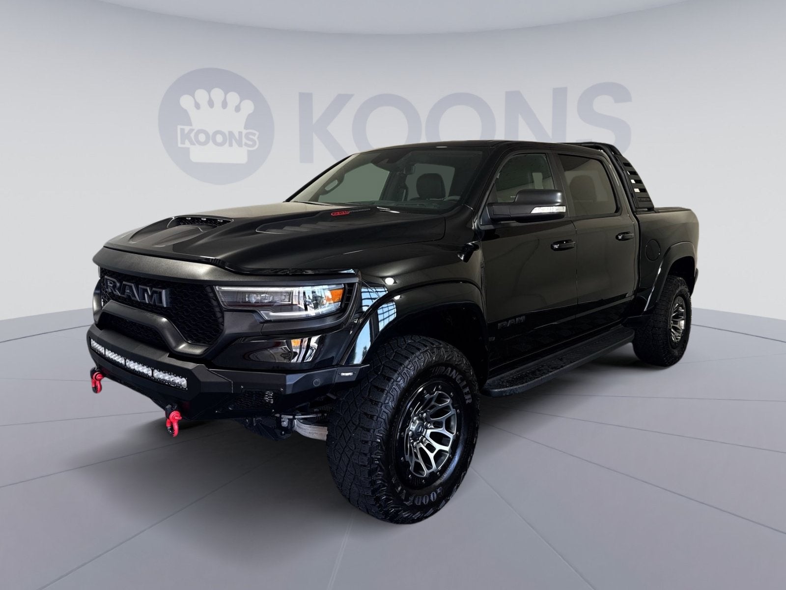 2021 RAM 1500 TRX in Diamond Black Crystal Pearlcoat — front three-quarter view