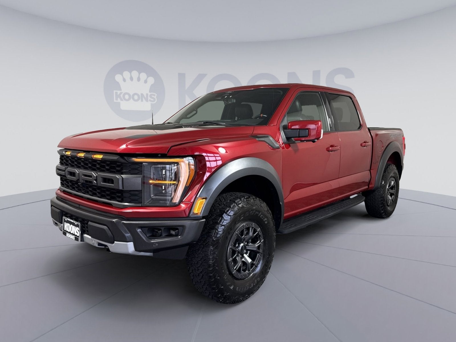 2022 Ford F-150 Raptor in Red Metallic — front three-quarter view
