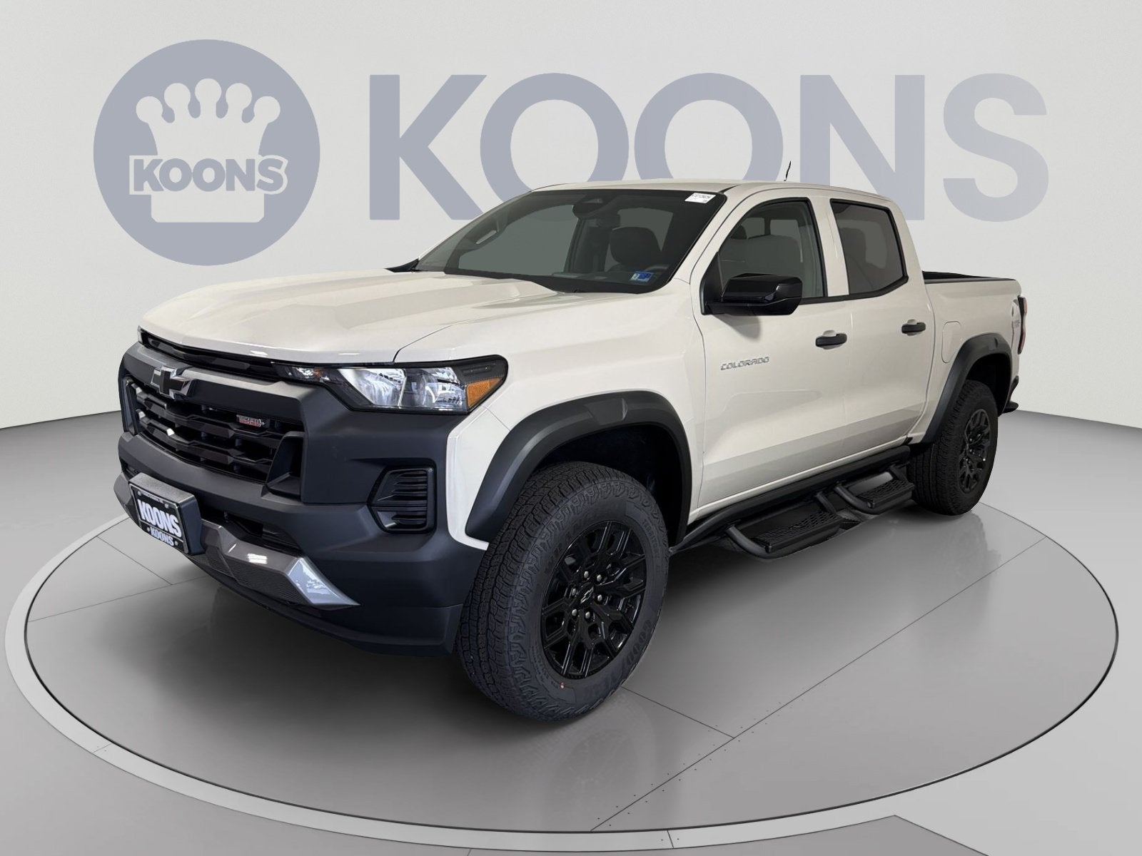 2026 Chevrolet Colorado Trail Boss in White Sands — front three-quarter view