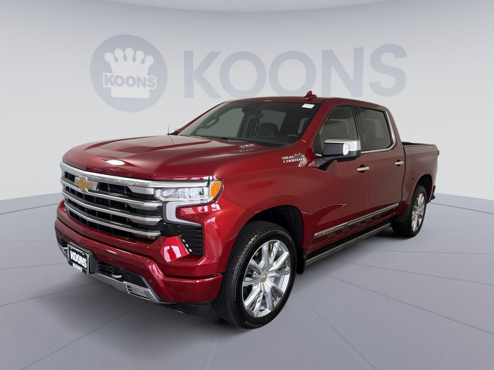 2025 Chevrolet Silverado 1500 High Country in Radiant Red Tintcoat — front three-quarter view