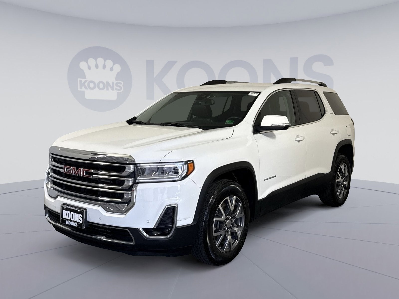 2023 GMC Acadia SLT in Summit White — front three-quarter view