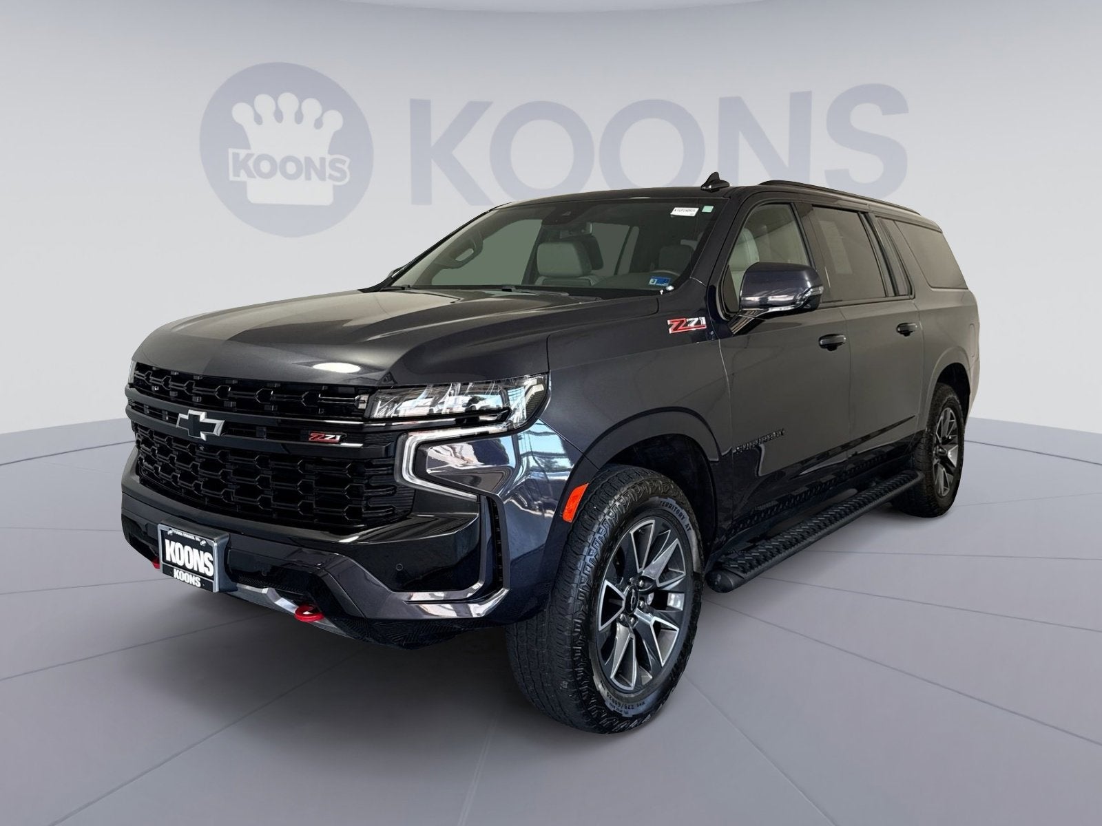 2024 Chevrolet Suburban Z71 in Dark Ash Metallic — front three-quarter view