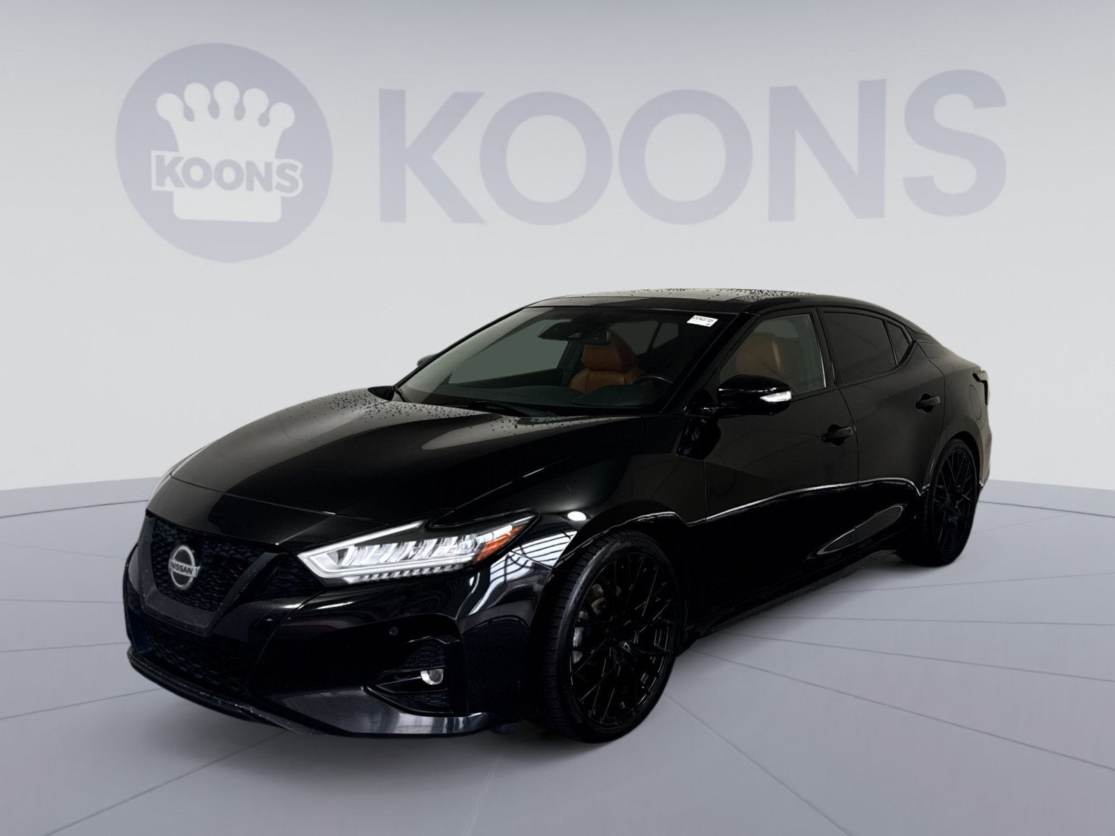 2019 Nissan Maxima Platinum in Super Black — front three-quarter view