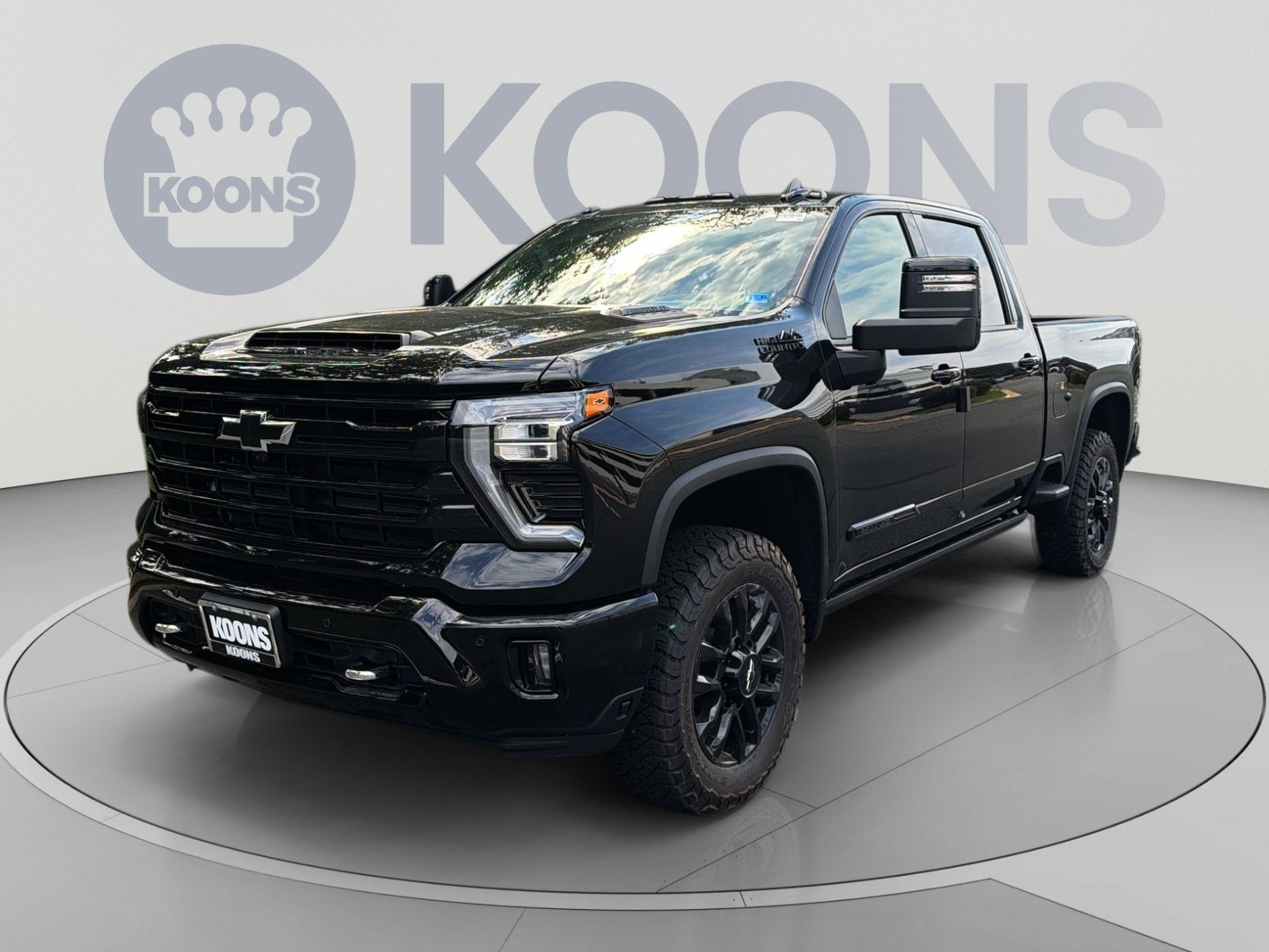 2026 Chevrolet Silverado 2500 HD High Country in Black — front three-quarter view