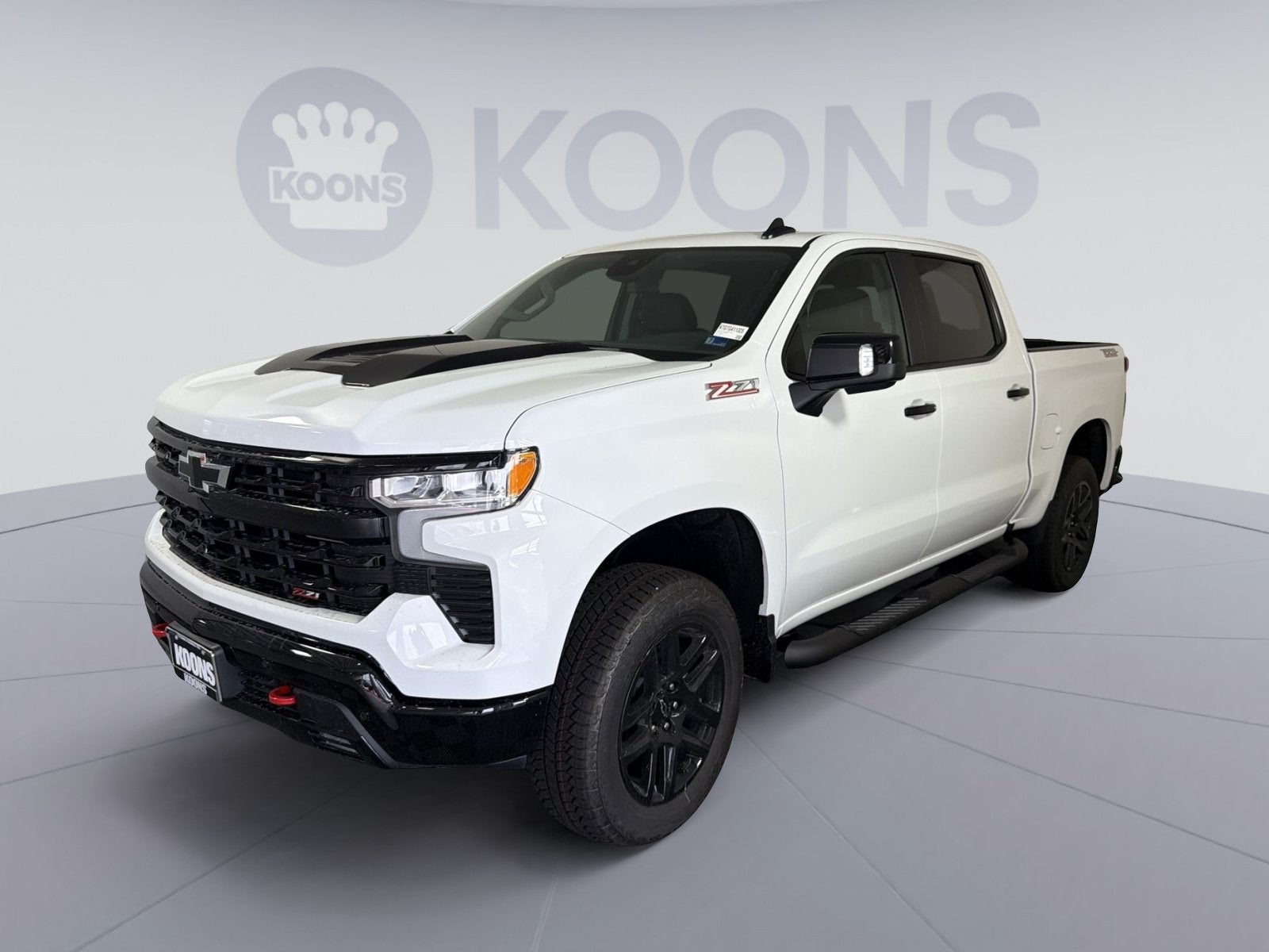 2026 Chevrolet Silverado 1500 LT Trail Boss in Summit White — front three-quarter view