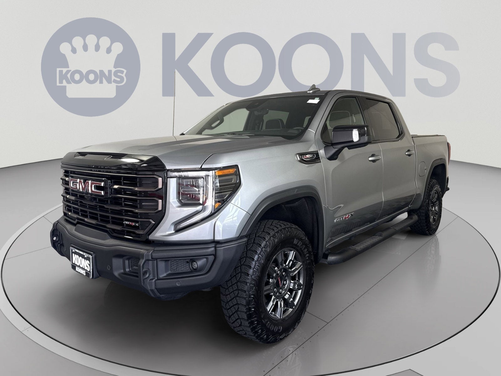 2025 GMC Sierra 1500 AT4X in Sterling Metallic — front three-quarter view
