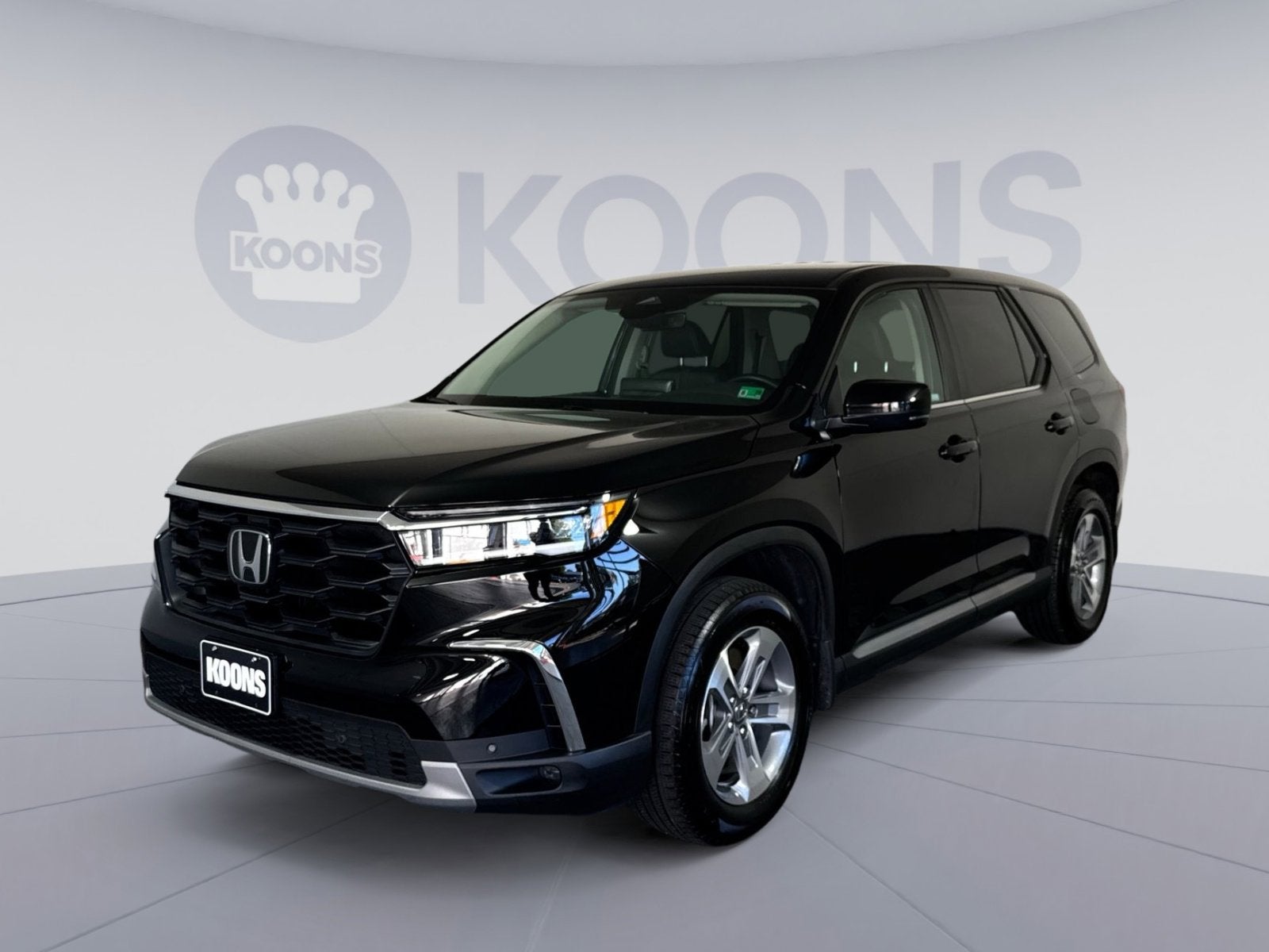 2025 Honda Pilot EX-L in Black — front three-quarter view