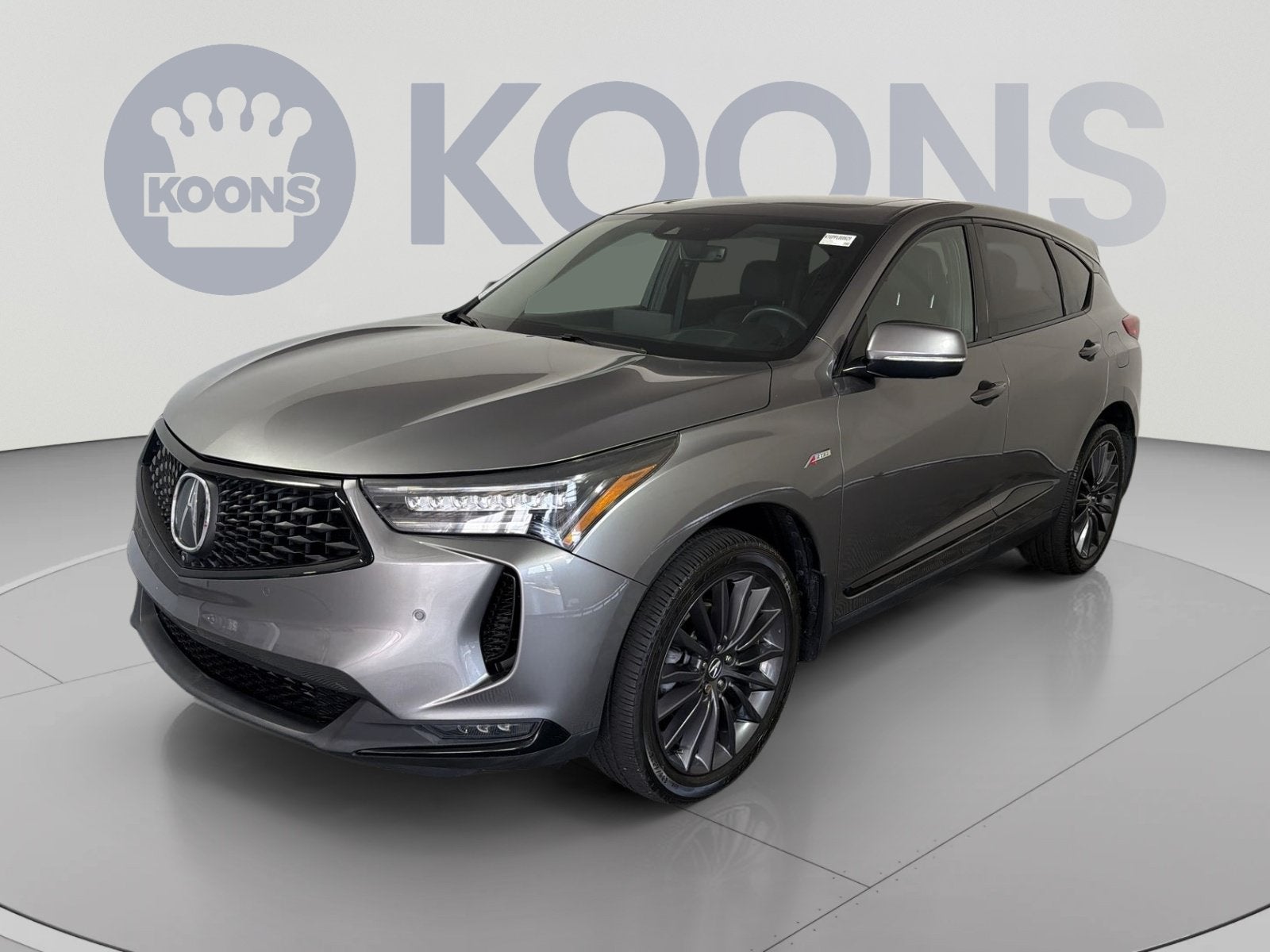 2023 Acura RDX w/A-Spec Advance Package in Liquid Carbon Metallic — front three-quarter view