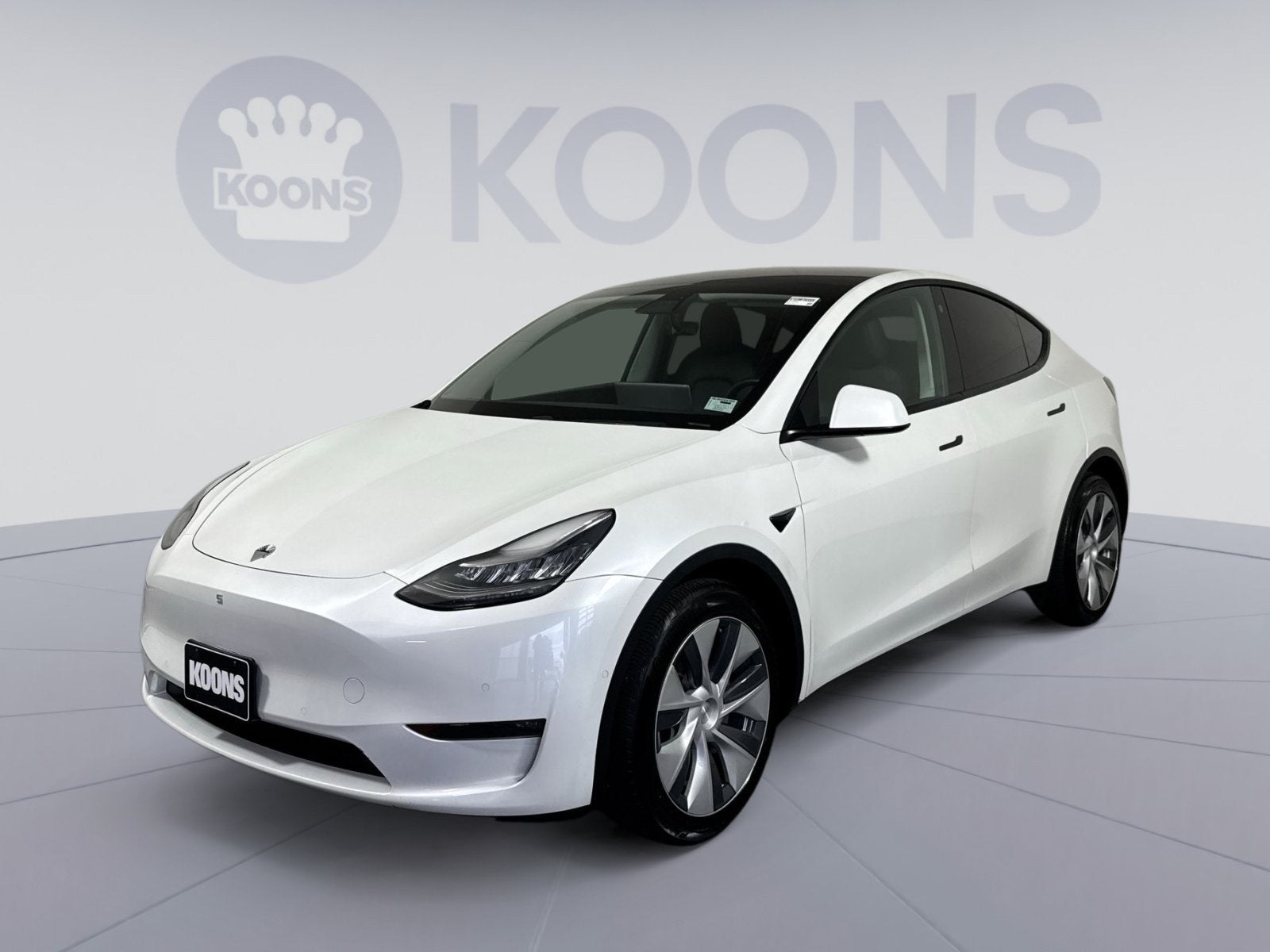 2021 Tesla Model Y Long Range in White — front three-quarter view