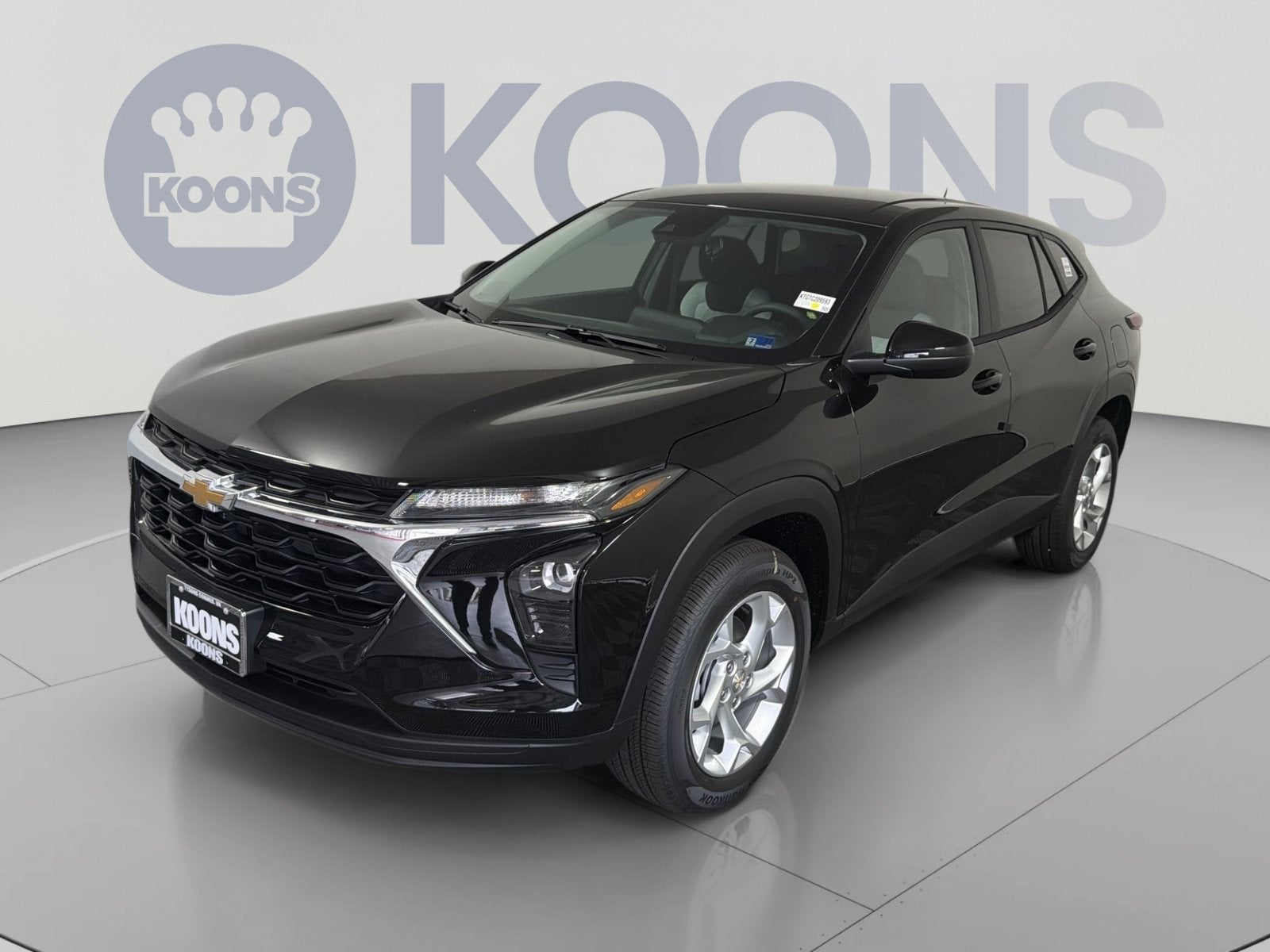 2026 Chevrolet Trax LS in Mosaic Black Metallic — front three-quarter view