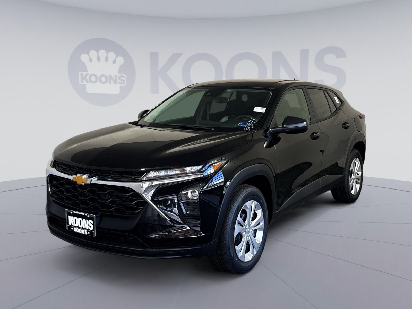 2026 Chevrolet Trax LS in Mosaic Black Metallic — front three-quarter view