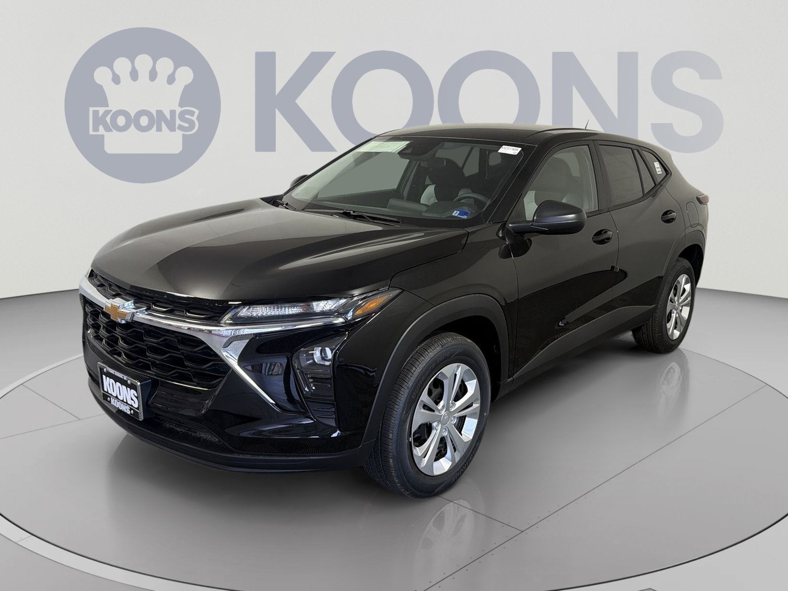 2026 Chevrolet Trax LS in Mosaic Black Metallic — front three-quarter view