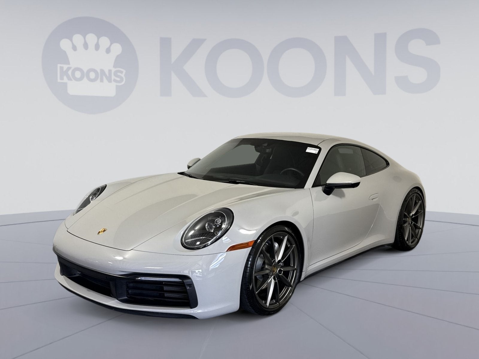 2021 Porsche 911 Carrera in Chalk — front three-quarter view